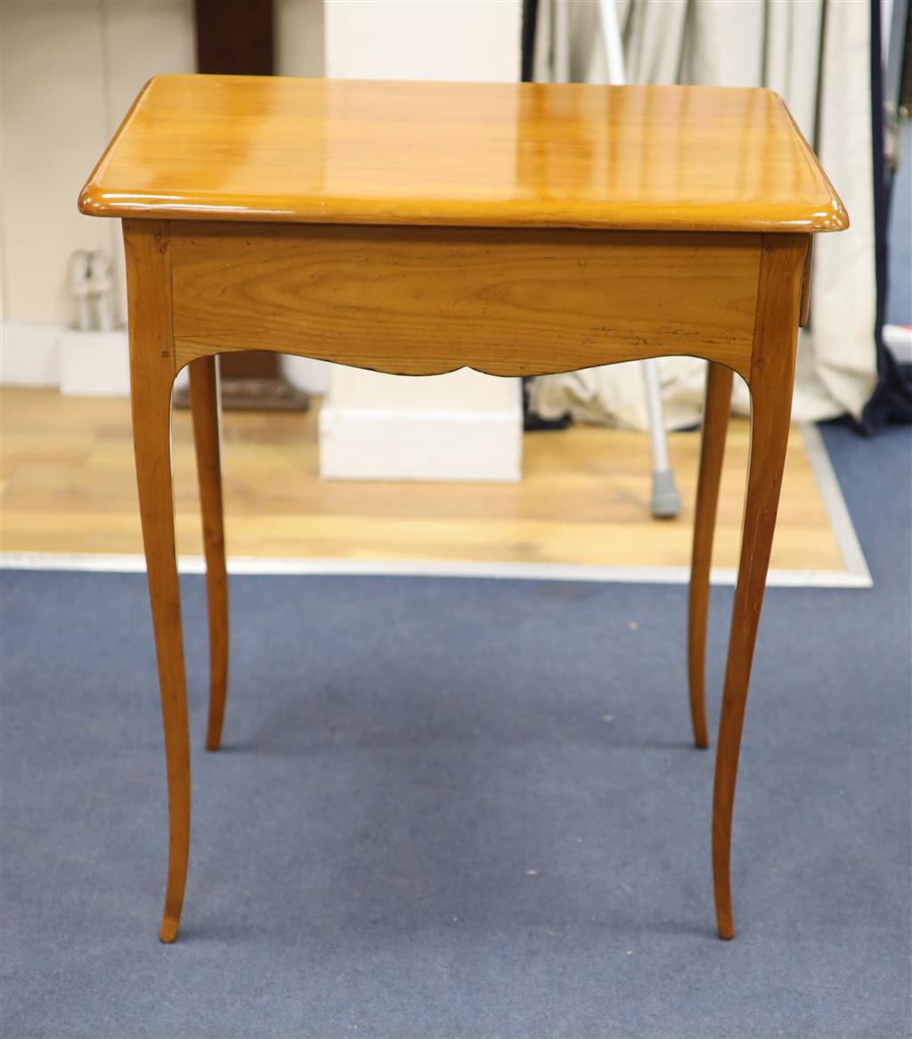 A 19th century Biedermeier cherrywood side table, fitted with a single drawer, raised on cabriole legs